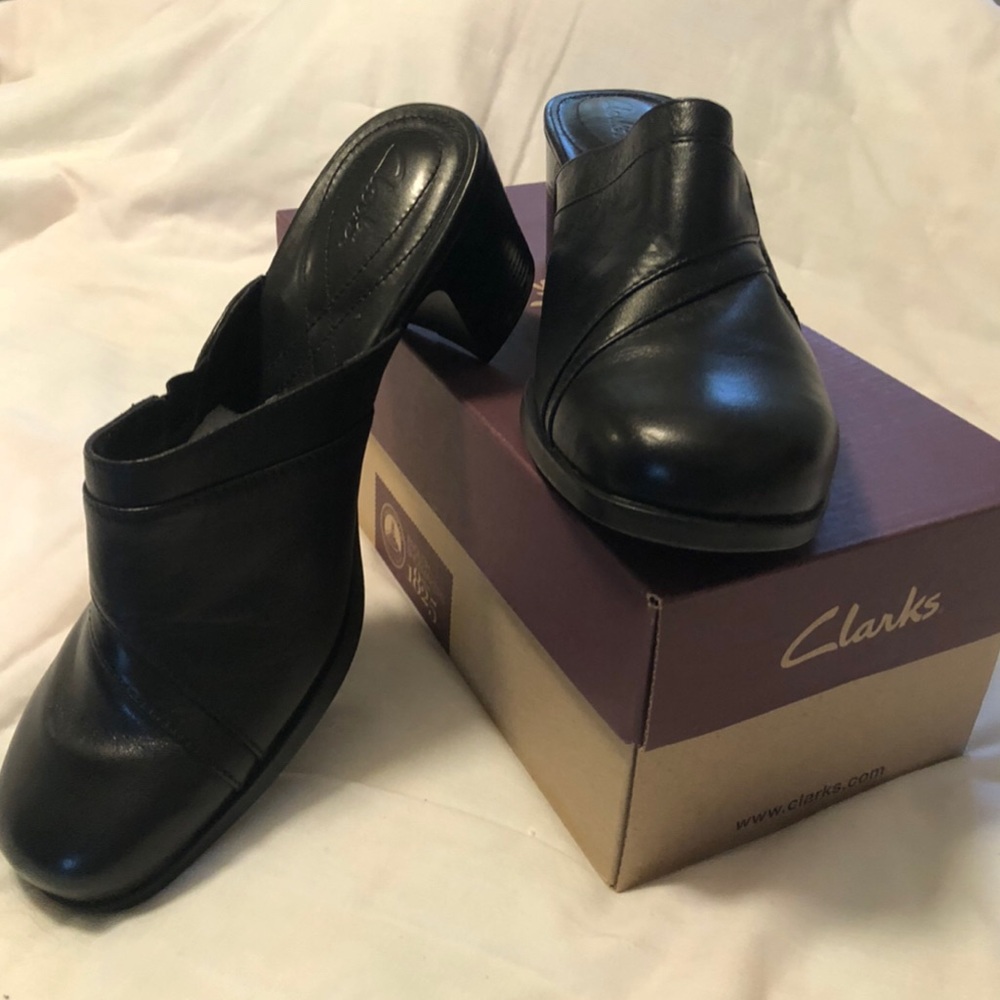 Clarks black leather clogs. Never worn.  Size 9M